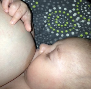 Baby and mom breastfeeding with IGT